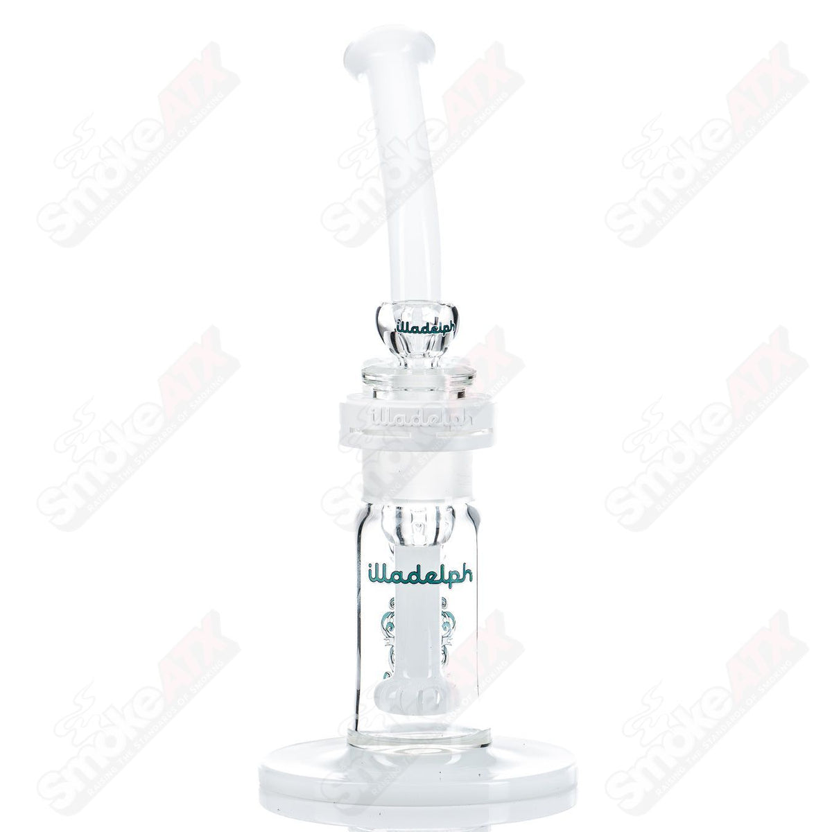 Teal Illadelph glass waterpipe bubbler with intricate design and clear glass accents, showcasing a stylish smoking accessory.
