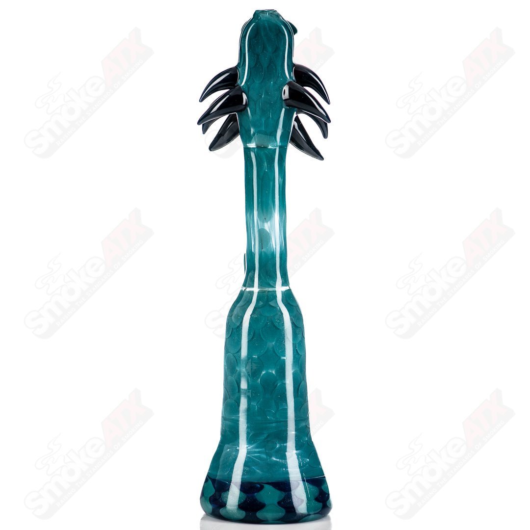 Focused Fire Dragon Tube waterpipe made of heady glass with intricate dragon design and clear glass body for smooth smoking.