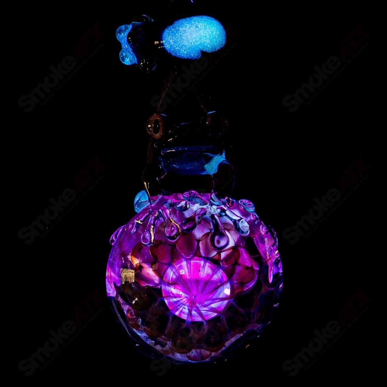 Kengtaro Tier 3 Pendant made of colorful Kengtaro glass with intricate design, hanging as a stylish heady glass pendant.