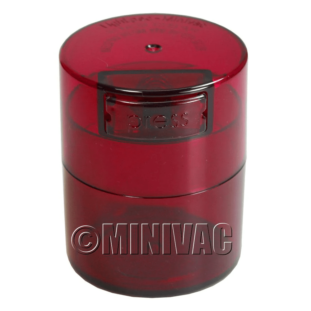 Mini TightVac Storage Container TV1 in clear plastic, 1.4oz capacity, designed for airtight food and item storage.