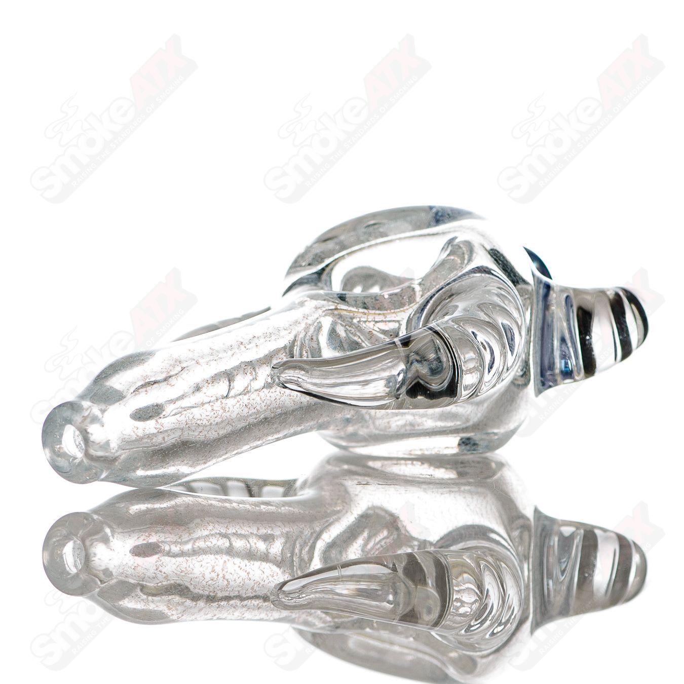 Transparent Dichro 4-Horned Spoon hand pipe with purple accent and JMK Glass signature, featuring a unique horned design.