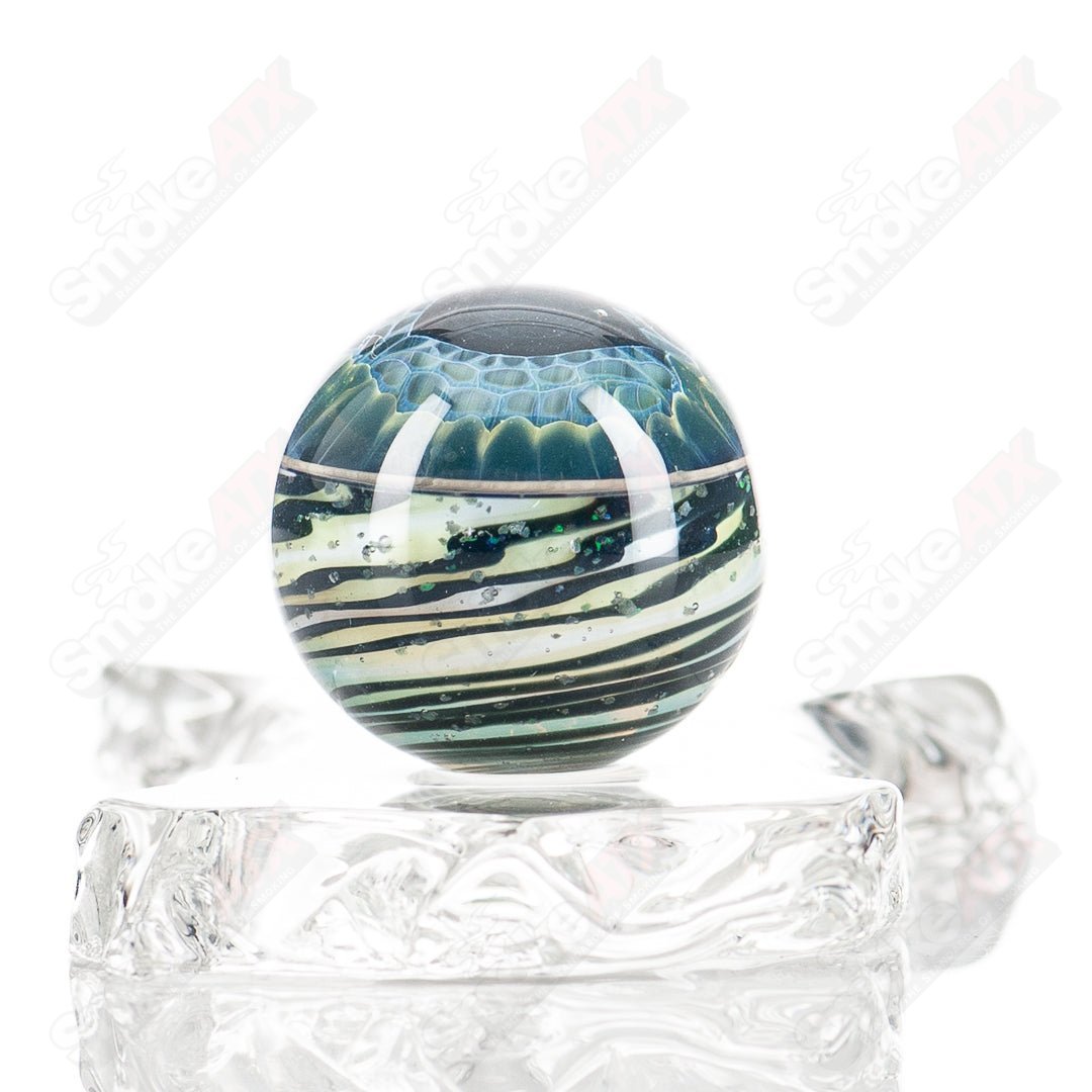 Indo Glass Cropal Wag Eye Mib heady glass with colorful marbles, showcasing intricate glasswork and vibrant design.