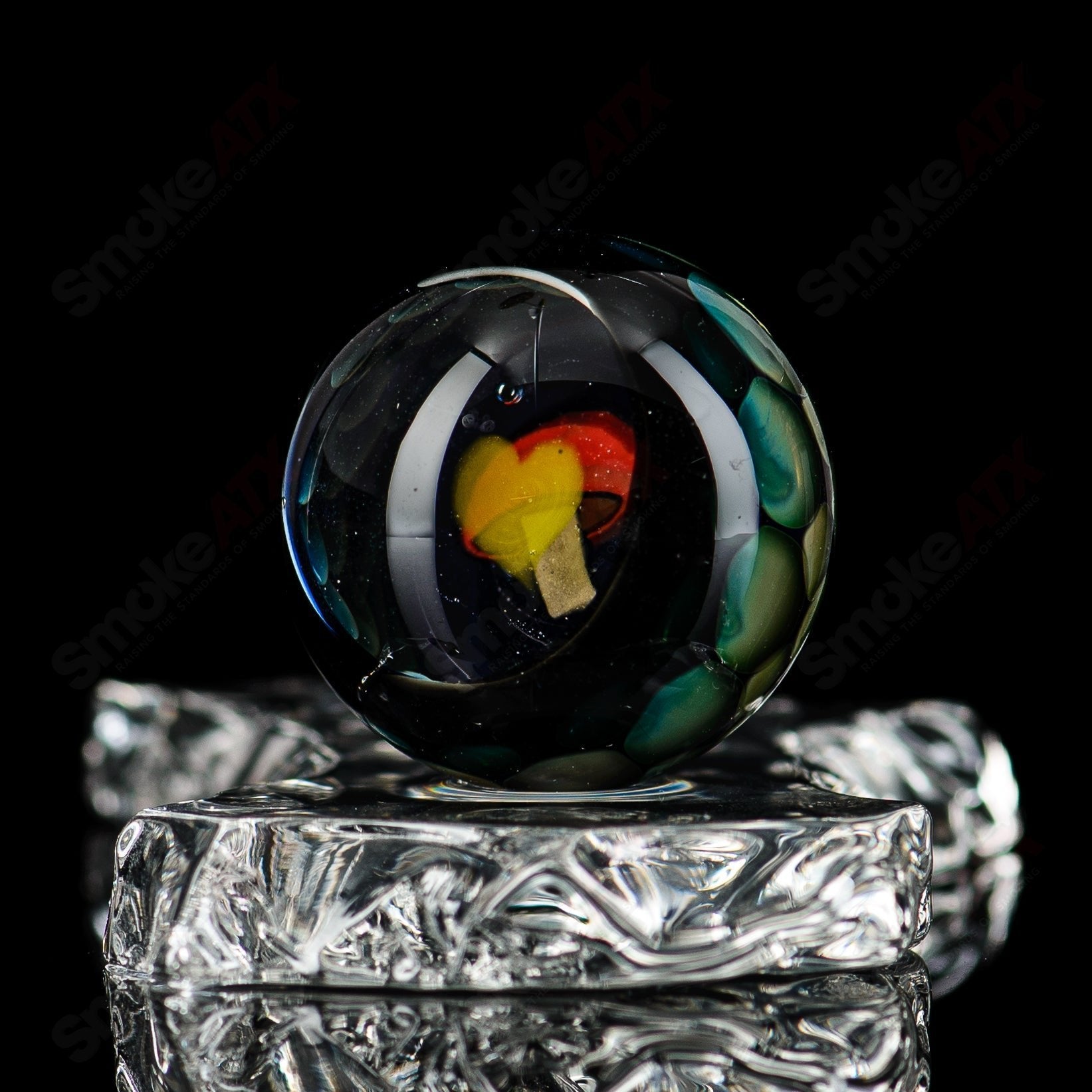 Colored marble glass balls from Flex Glass, showcasing smooth, shiny marbles with a marble pattern in various colors.