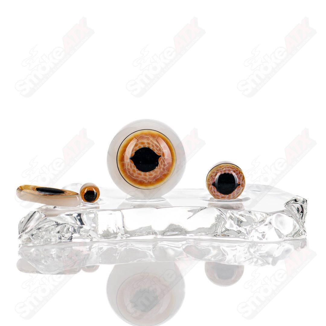 Deluxe Indo Glass Eye Slurper Set featuring clear glass with textured design for smooth vapor inhalation and aesthetic appeal.
