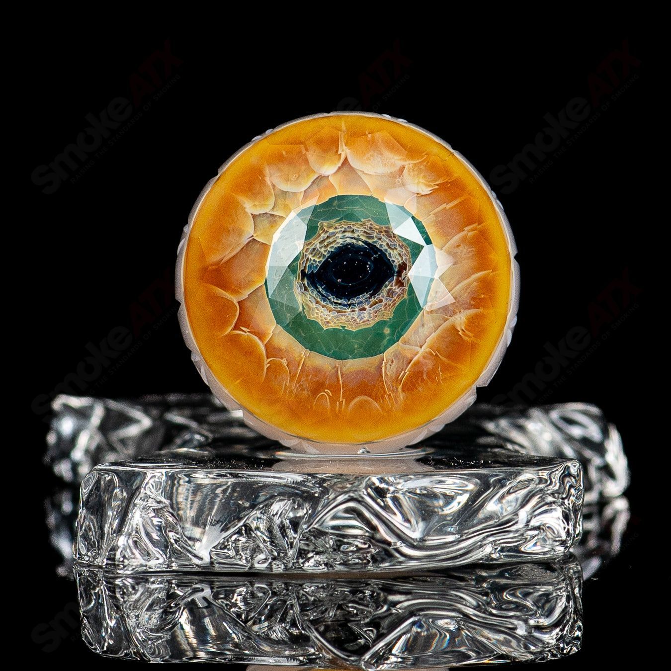 Indo Glass faceted Dragon Eye marble with colorful Fatal Facets pattern, showcasing intricate glass craftsmanship and vibrant design.
