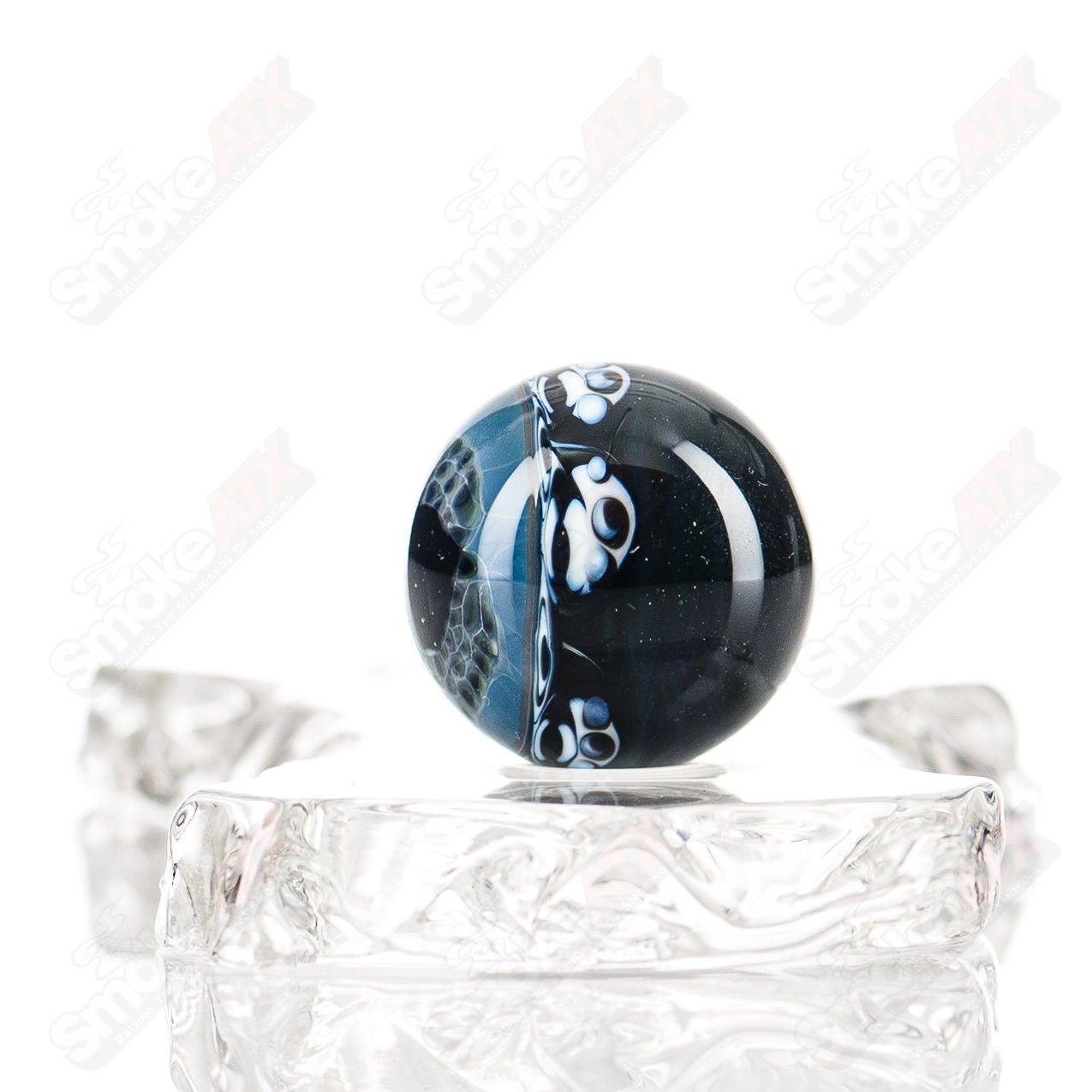 Black Magic UV Dotstack Eye marble by Indo Glass, 24mm heady glass piece with vibrant colors and intricate design.