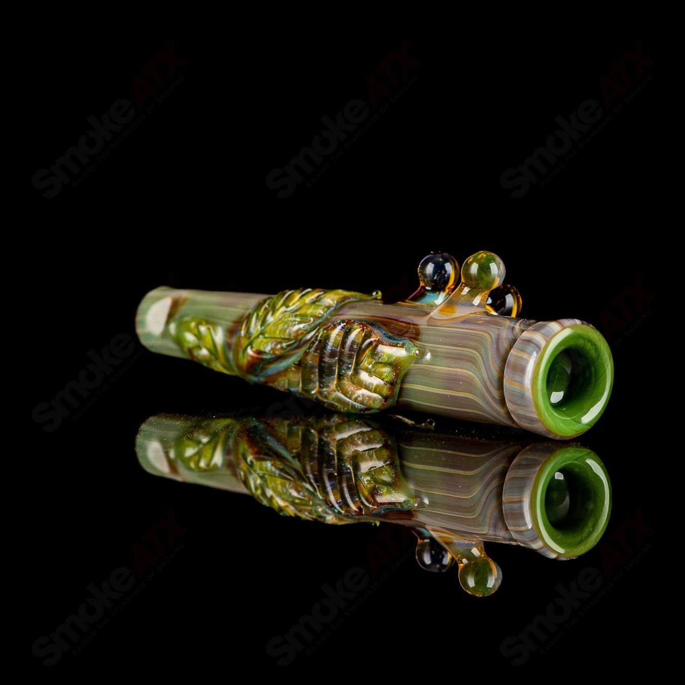 Wood grain Chillum by Mr. Gray, a handcrafted Heady Glass hand pipe with realistic wood finish and sleek design.