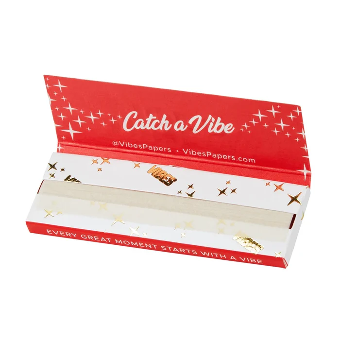 Vibes 1 1/4 hemp rolling papers for rolling cigarettes or herbal blends, featuring natural hemp material and lightweight design.