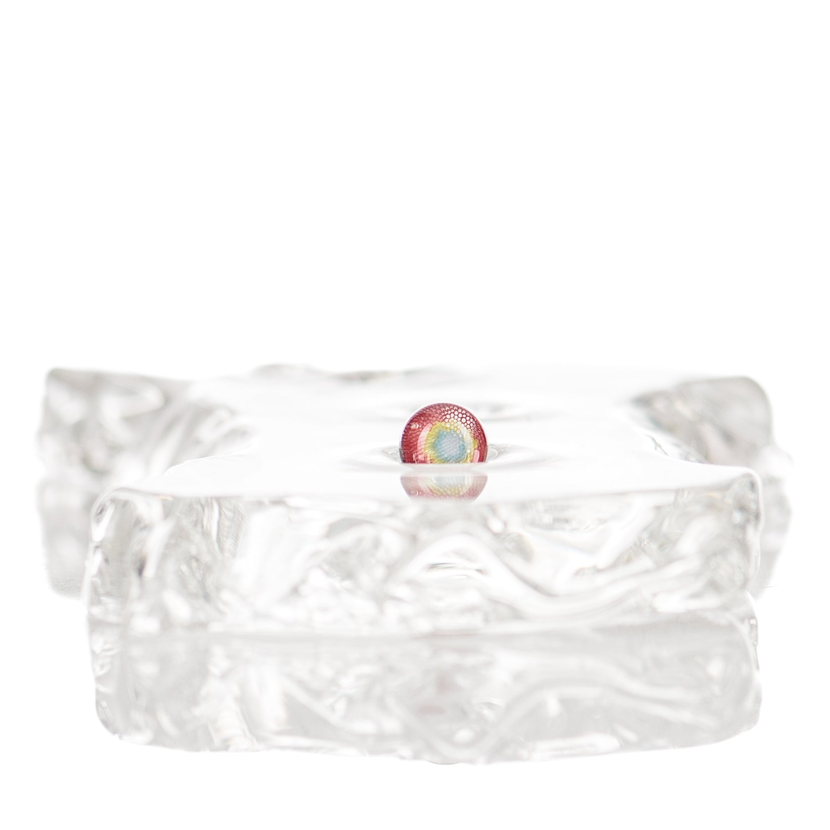 Pearl Dosa glass with clear glass body and decorative pearl inserts, featuring elegant design and brand Dosa Glass.