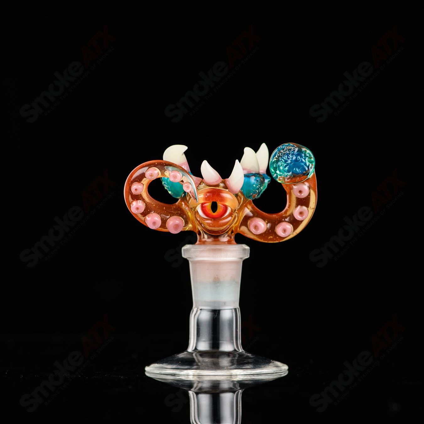 Salt Glass UV reactive 14mm 3-hole slide for heady glass bowls, featuring vibrant, glow-in-the-dark design with SPG x SALT branding.
