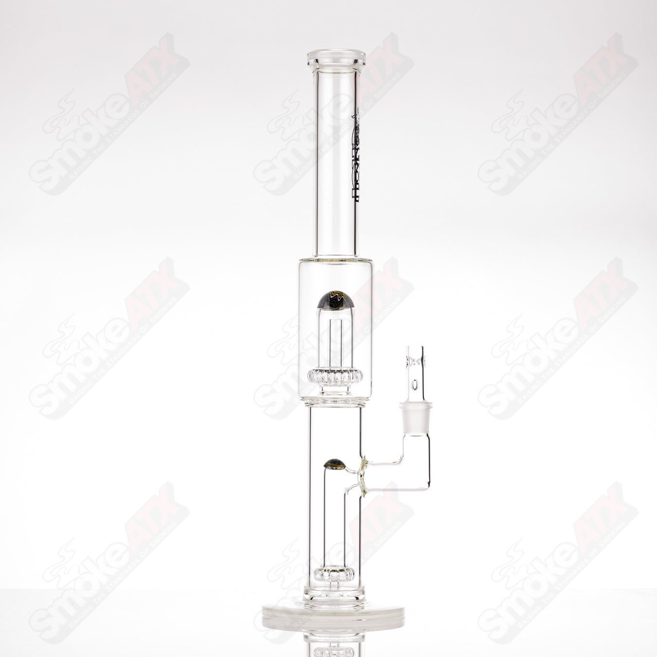 Toro 18mm full-size circular-to-circular glass straight tube with worked sections, designed for smoking or water filtration.