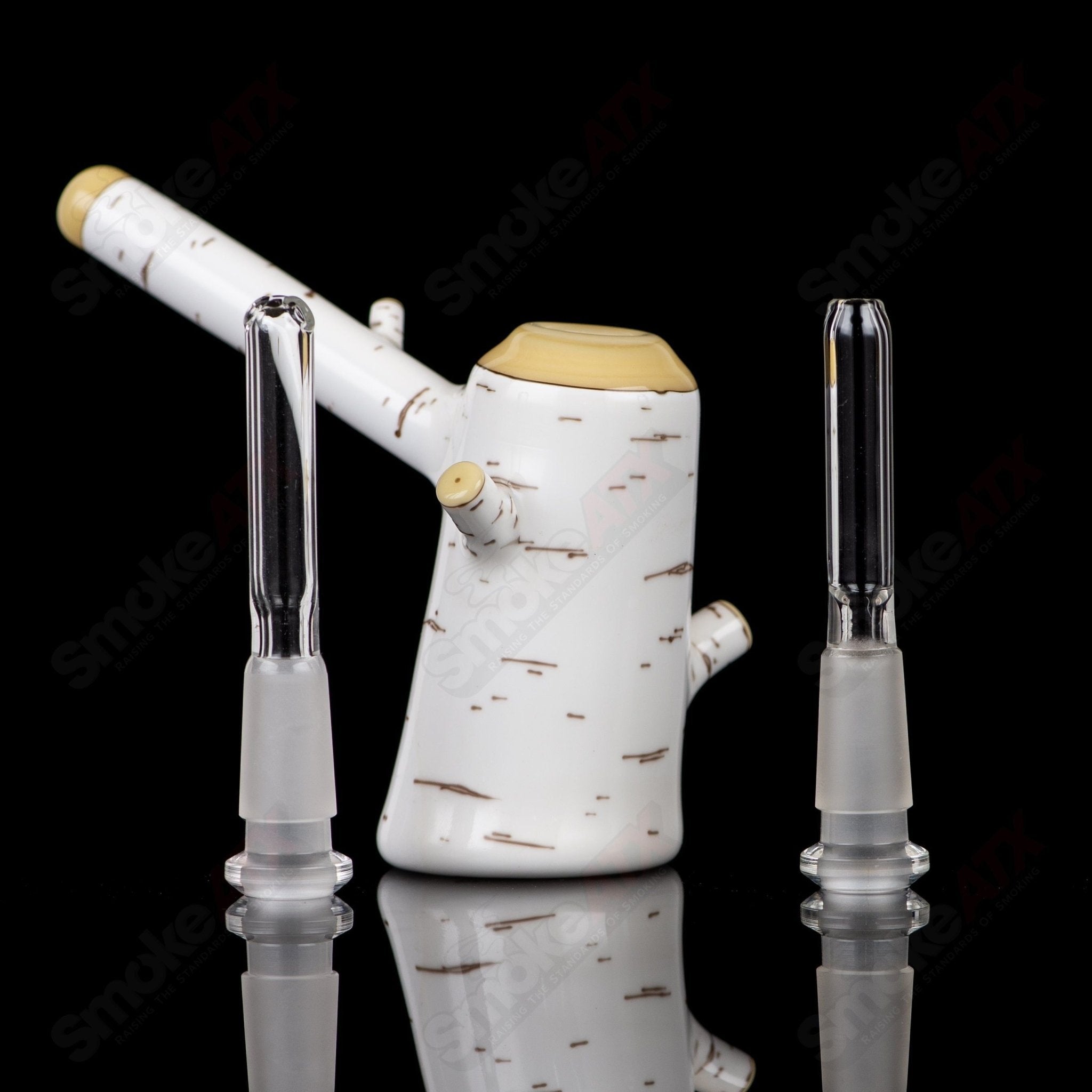 Foster Glass Birch Poker Rig, a heady glass concentrate rig with intricate design and clear glass construction.