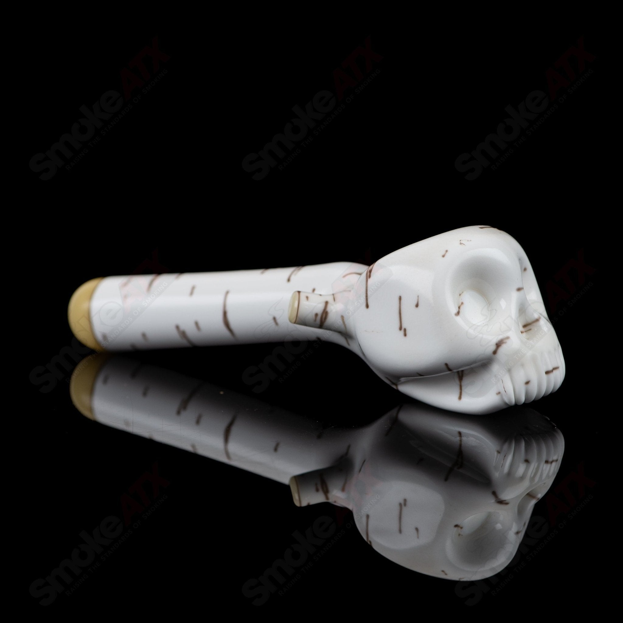 Foster Glass Birch Skull Spoon heady glass hand pipe with detailed birch bark design and skull-shaped bowl for smoking accessories.