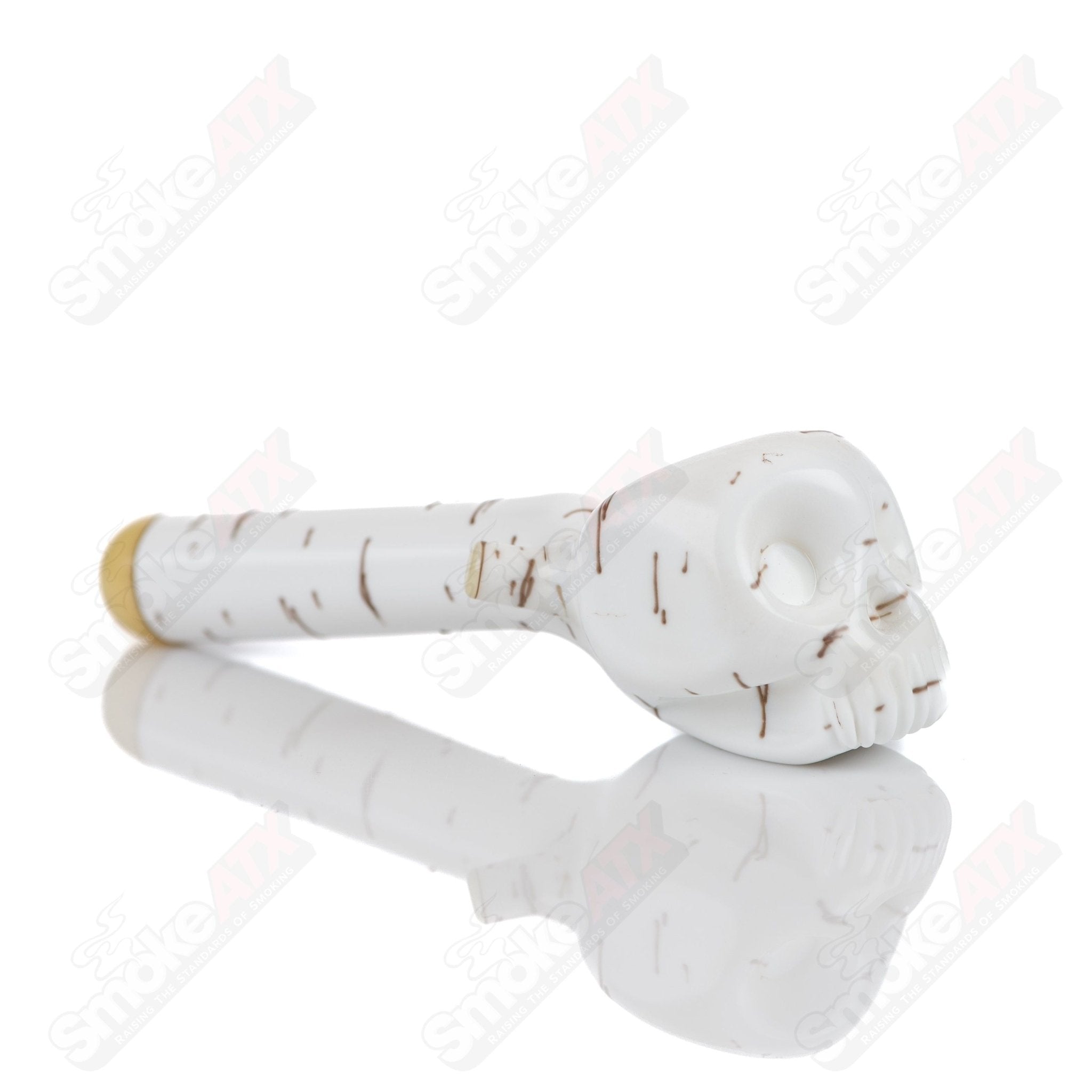 Foster Glass Birch Skull Spoon Heady Glass hand pipe with detailed skull design, made of clear glass, for smoking accessories.