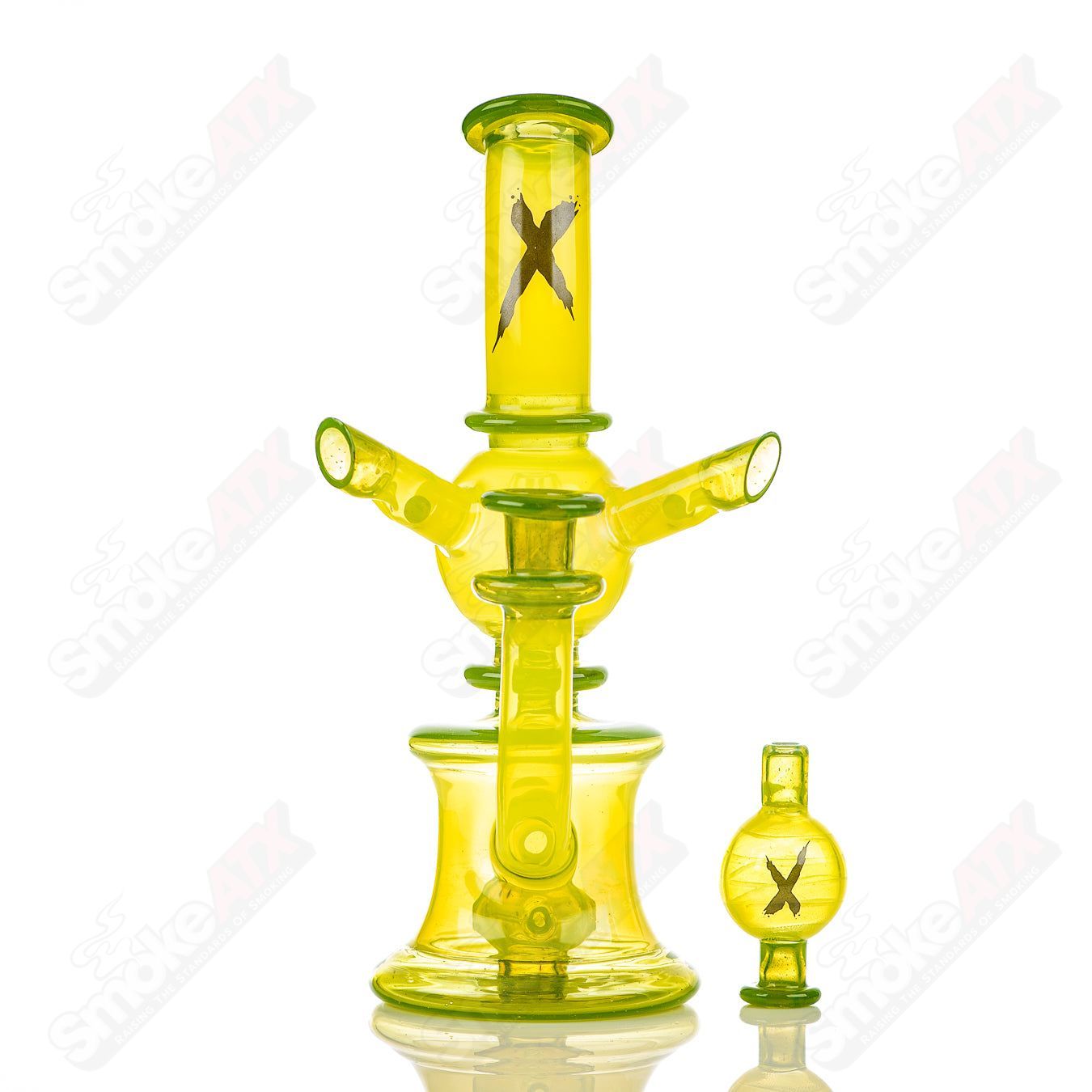 Colored Xhalerator RAM Robert Mickelsen glass concentrate rig with vibrant colors and intricate glass art design.