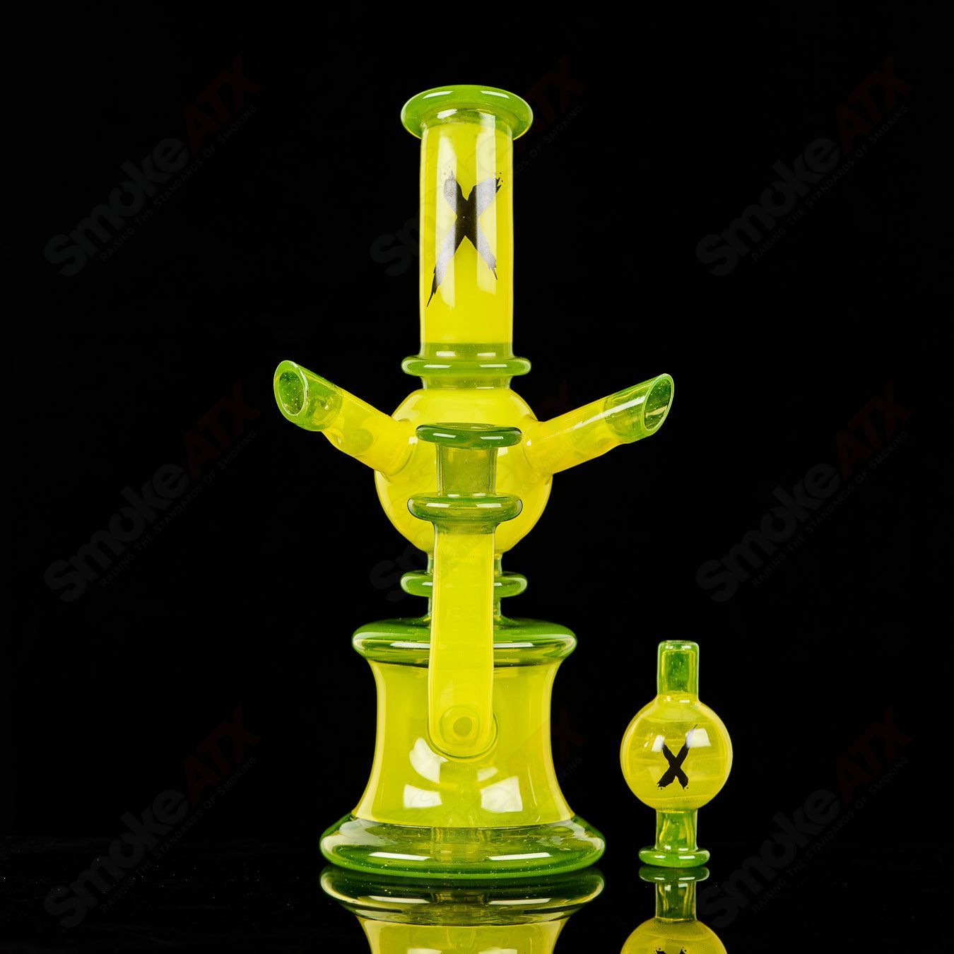Colorful Xhalerator RAM Robert Mickelsen glass concentrate rig with intricate design and vibrant hues, handcrafted heady glass art.