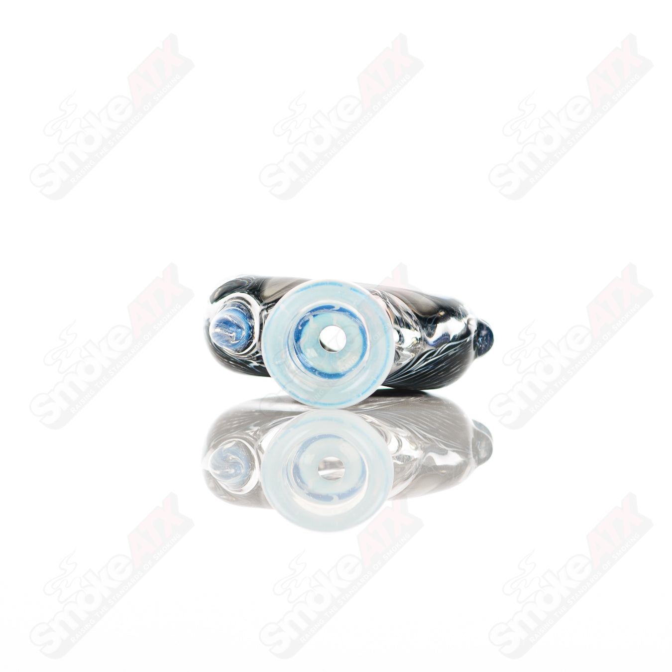 Small glass Chillum by Baby Dabs for dabbing concentrates, featuring a compact design and clear glass construction.