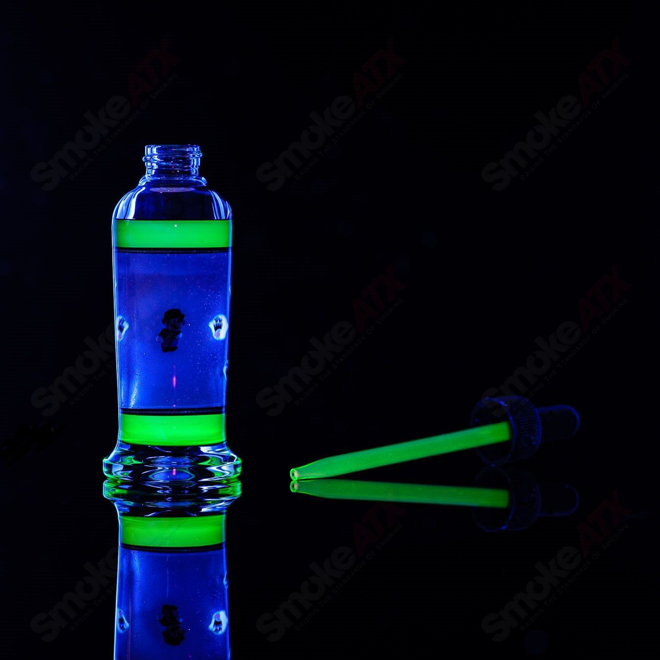 Micro Glass Heady Glass spray bottle with SPG x Micro branding, clear design and spray nozzle for versatile use