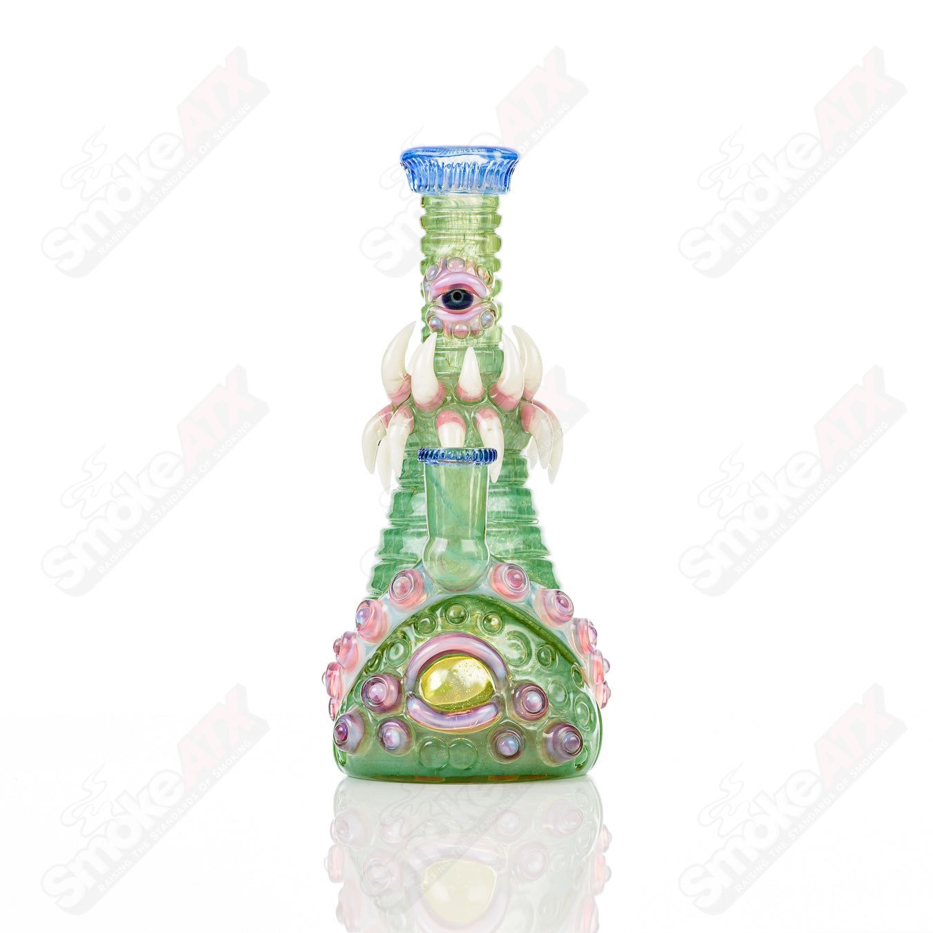 UV double barrelled Rip Curl concentrate rig by Salt Glass, featuring colorful heady glass design and intricate details.
