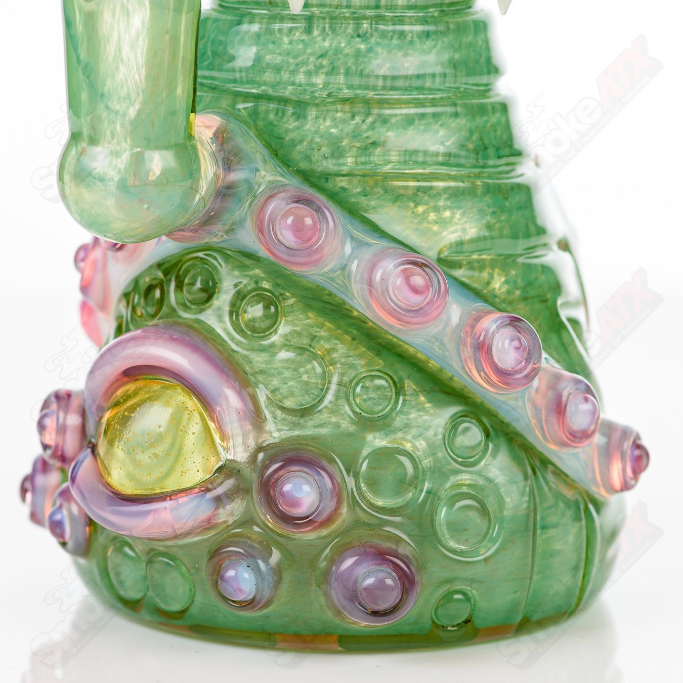 UV double barrelled Rip Curl concentrate rig by Salt Glass, featuring vibrant colors and intricate heady glass design.