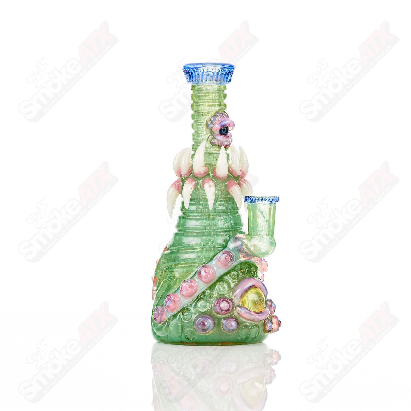 UV double barrelled concentrate rig by Salt Glass, featuring colorful heady glass design with Rip Curl branding and double barrel structure.