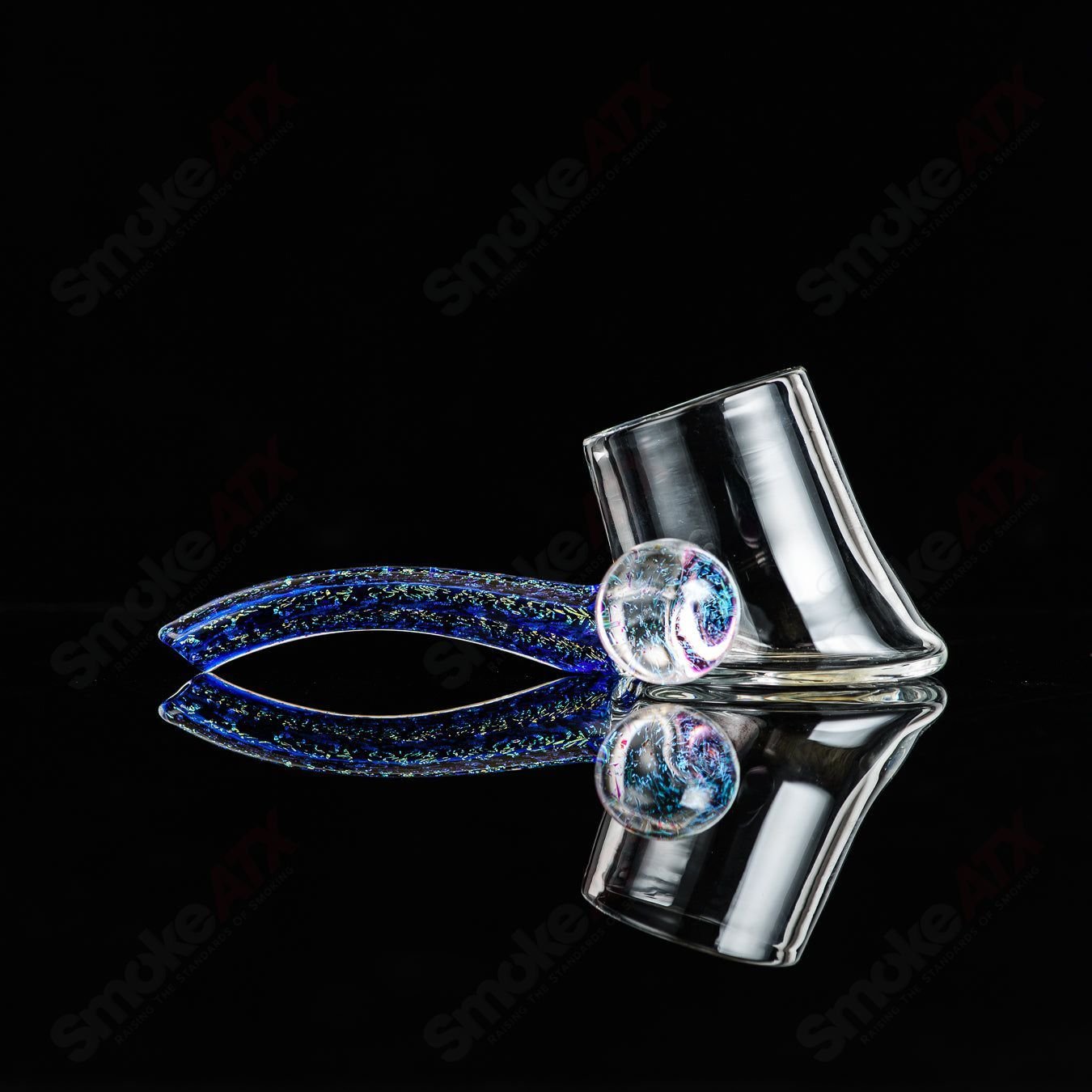 Glass Dichro Proxy Attachment by Justin Freeman, a colorful, reflective glass accessory with intricate patterns.