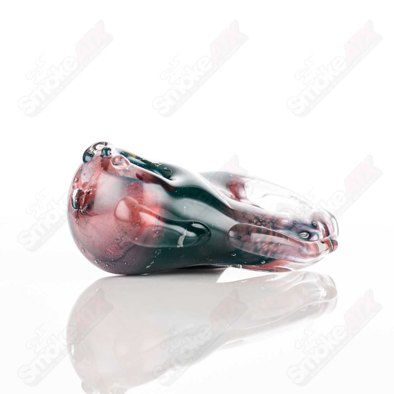 Glass pipe featuring a #10 Goddess design by Nobody, with intricate glass craftsmanship and colorful accents.