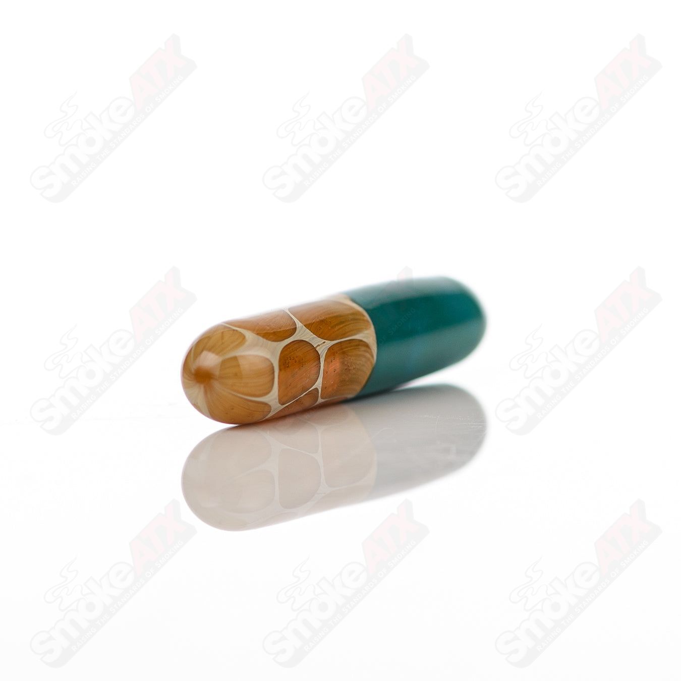 710 Products Robertson Glass #10 Terp Pill, clear glass concentrate container with a rounded shape and secure lid.