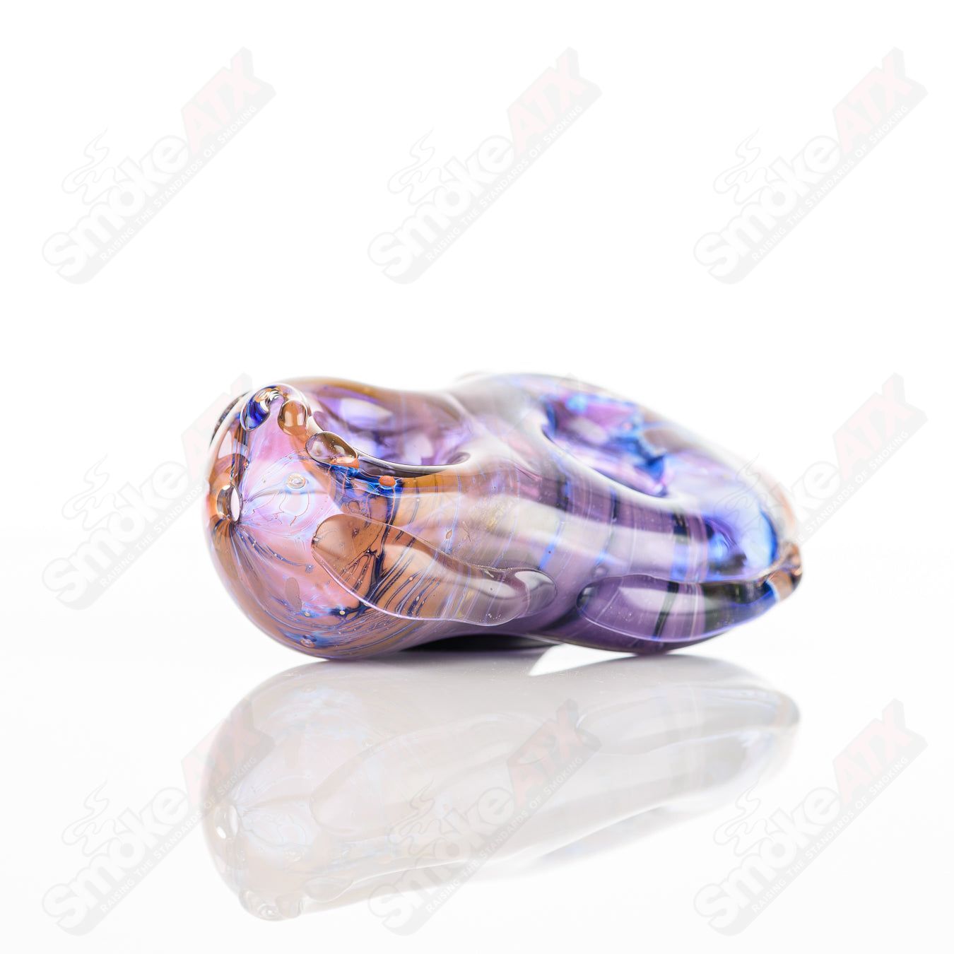 Glass pipe with a colorful donut chillum design by Nobody, featuring a clear glass body and intricate detailing.