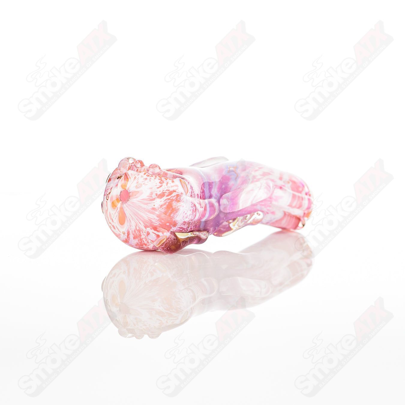 Glass pipe in the shape of a spoon from Nobody's Glass by Nobody collection, featuring clear glass with smooth curves.