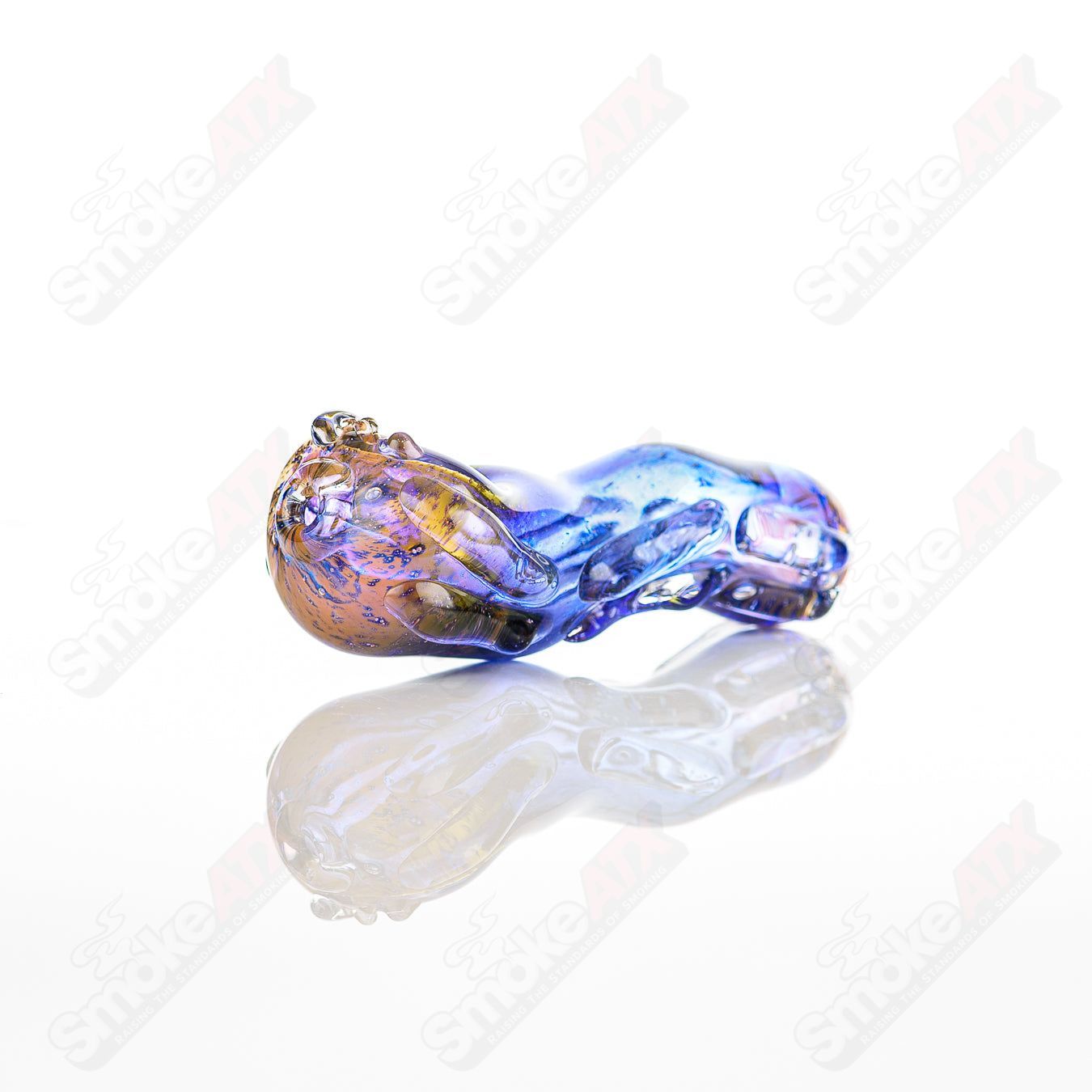 Glass pipe called Spoon Glass by Nobody, featuring a clear glass design with a rounded bowl and smooth mouthpiece.
