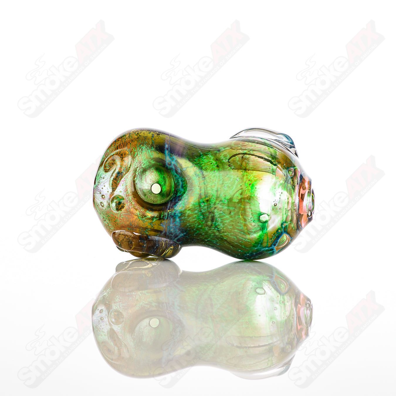 Glass pipe called the #18 Bean Spoon by Nobody, featuring a clear glass design with a rounded bowl and smooth shape.