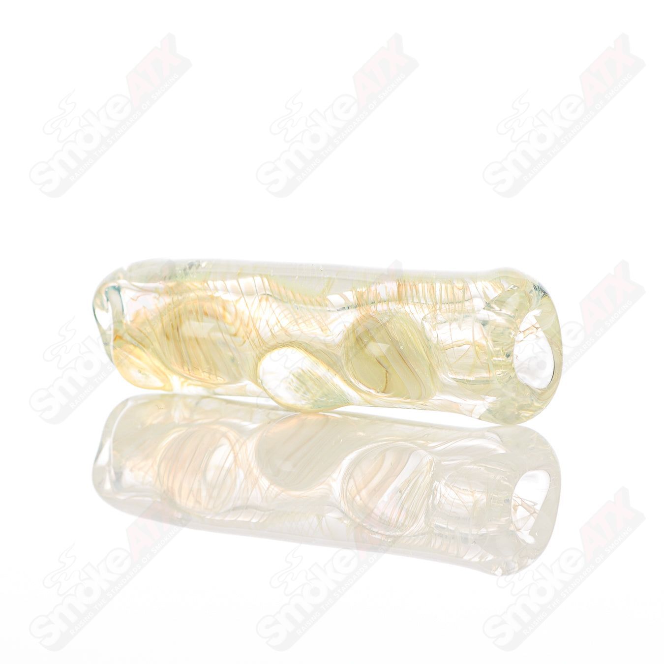 Texas Hot Glass 19 Taster Texas Hot Chillum glass with colorful design and clear glass body for smoking enjoyment.