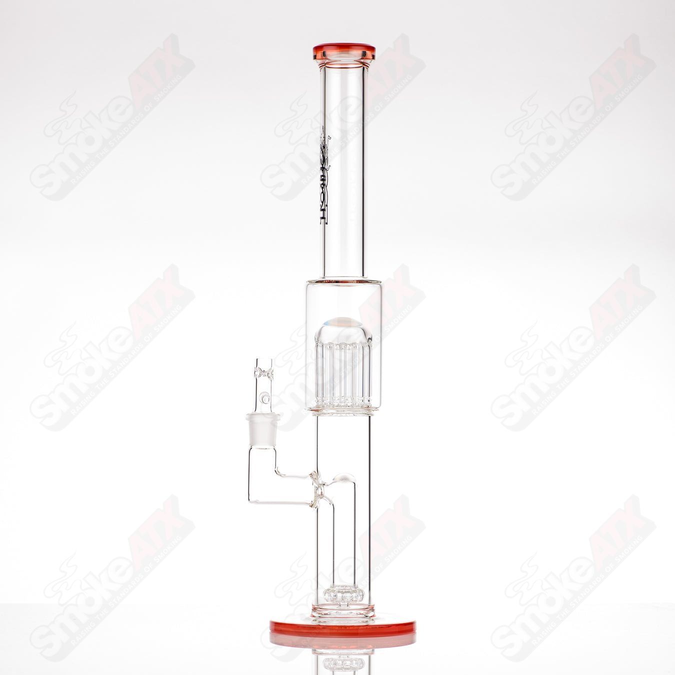 Toro 18mm straight glass bong with 13-arm perc, colorful foot and mouthpiece accents, designed for smooth water filtration.
