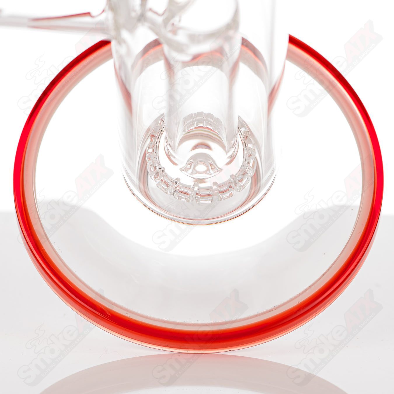 Toro 18mm circular to 13-arm perc glass straight tube with colorful foot and mouthpiece accents, designed for smooth hits.