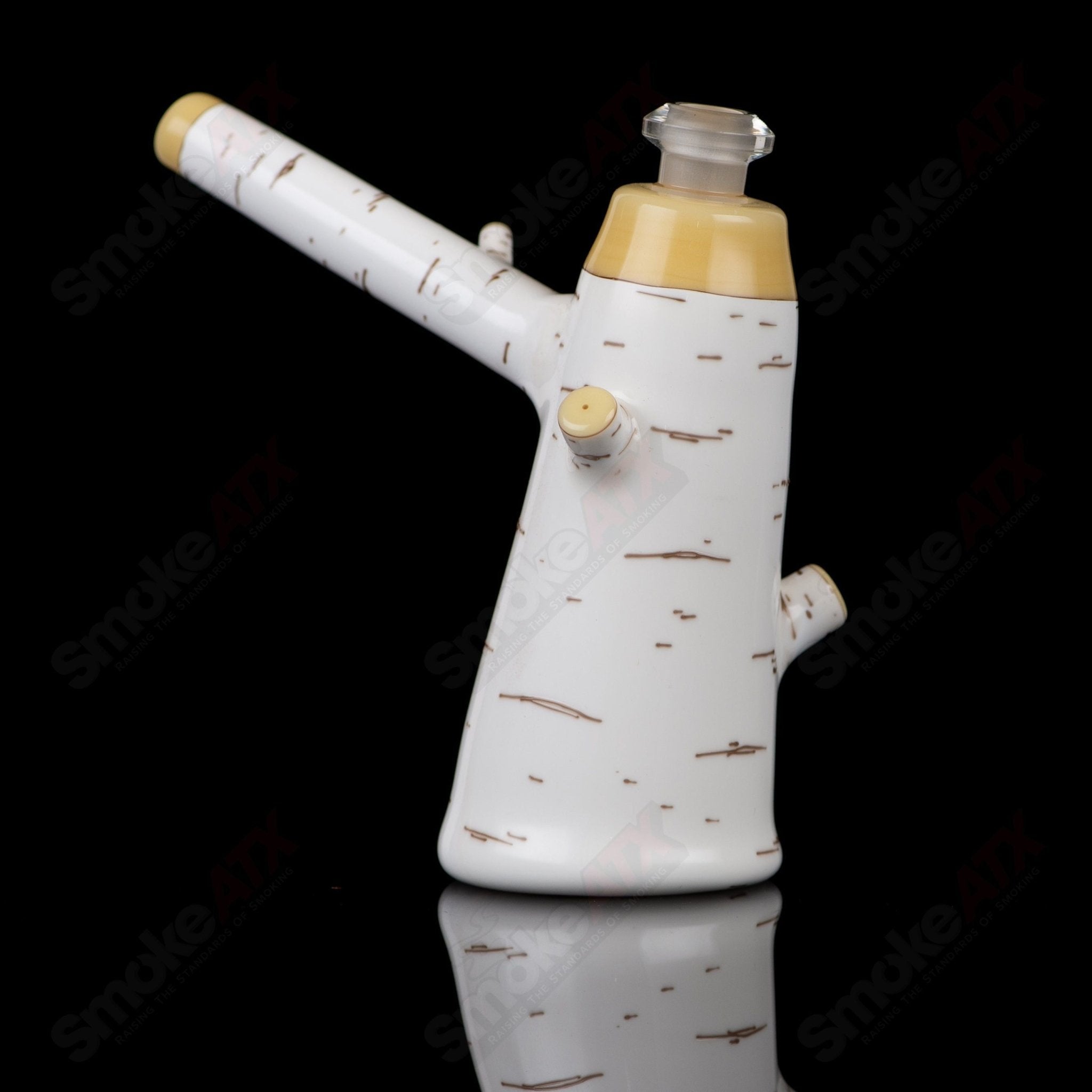 Foster Glass Birch Poker Rig, a heady concentrate rig with intricate glasswork and a clear, textured design.