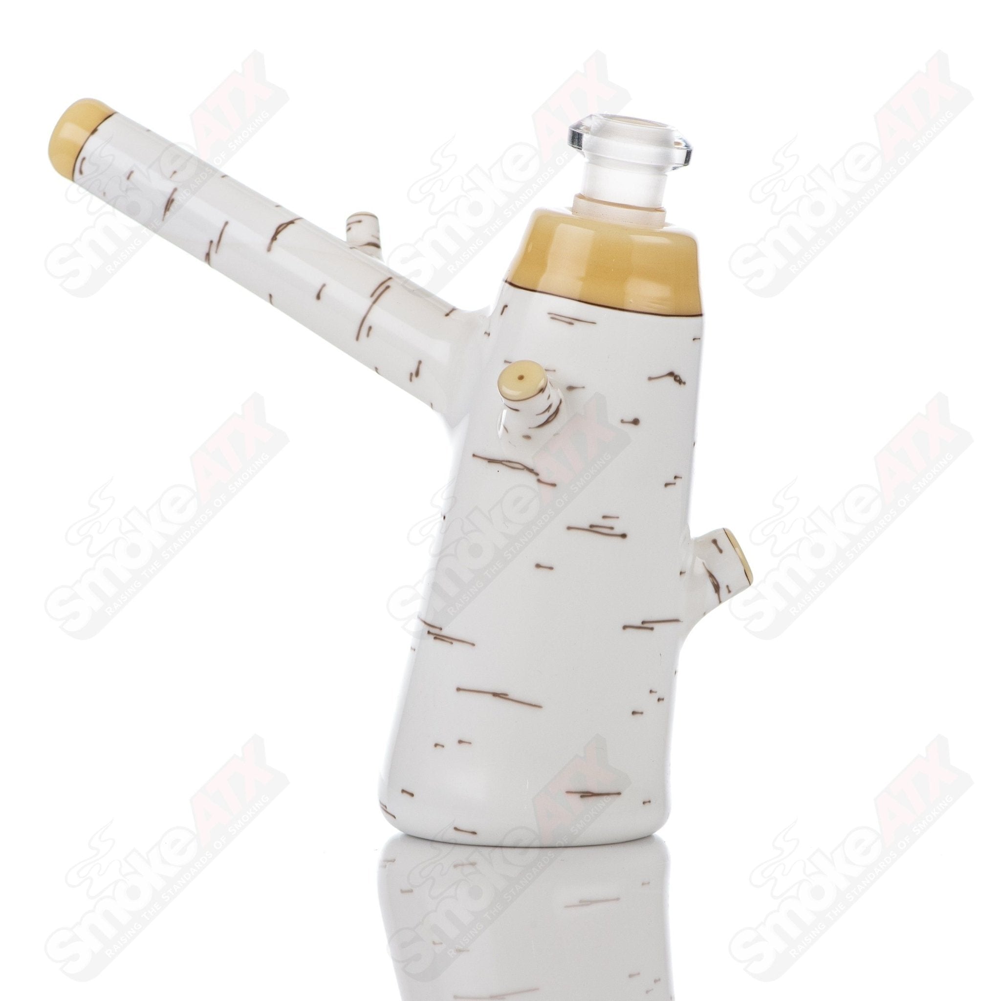 Foster Glass Birch Poker Rig, a heady concentrate rig with intricate glass design and multiple chambers for filtering and smoking.