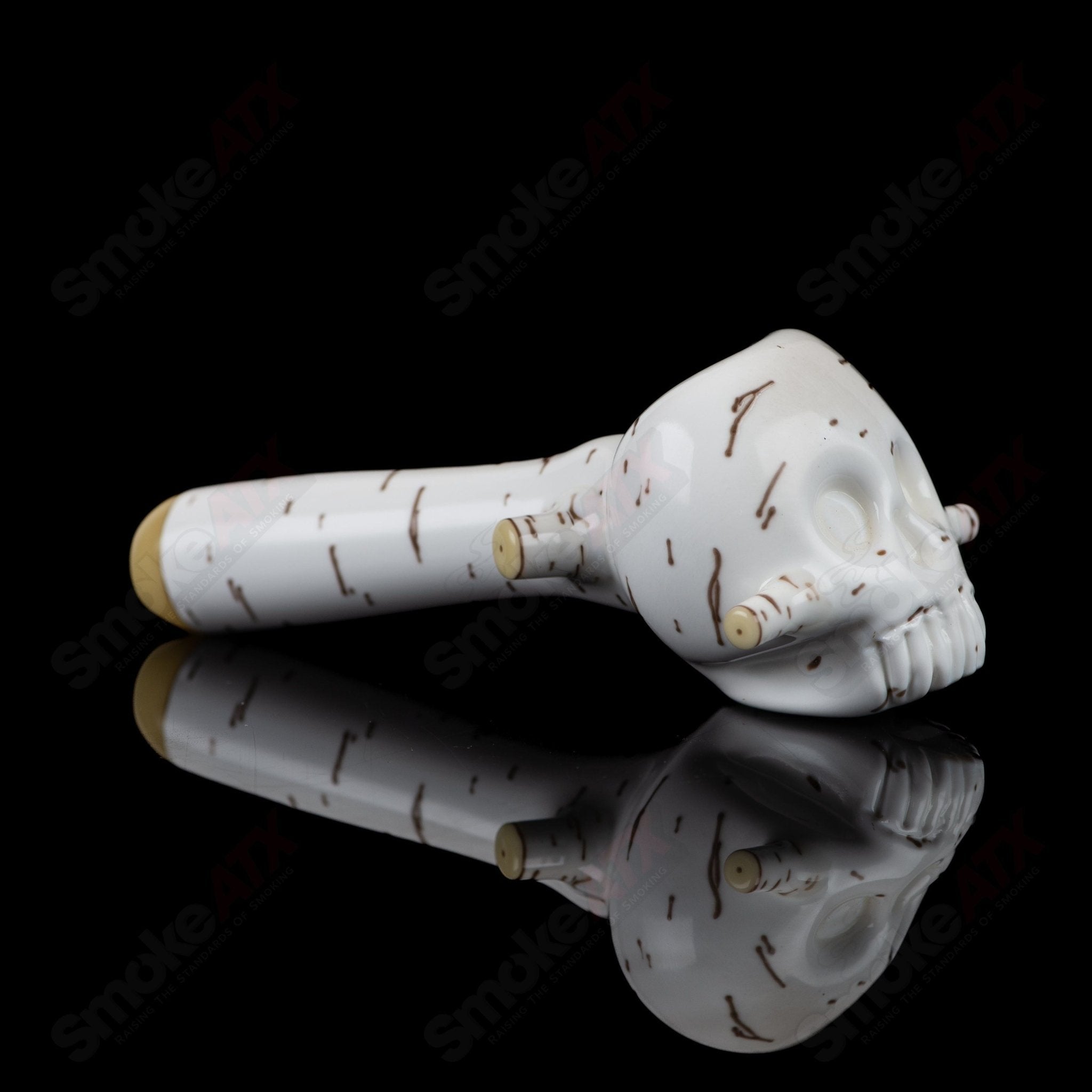 Foster Glass Birch Skull Spoon Heady Glass hand pipe with detailed wood grain design and skull motif for smoking accessory.