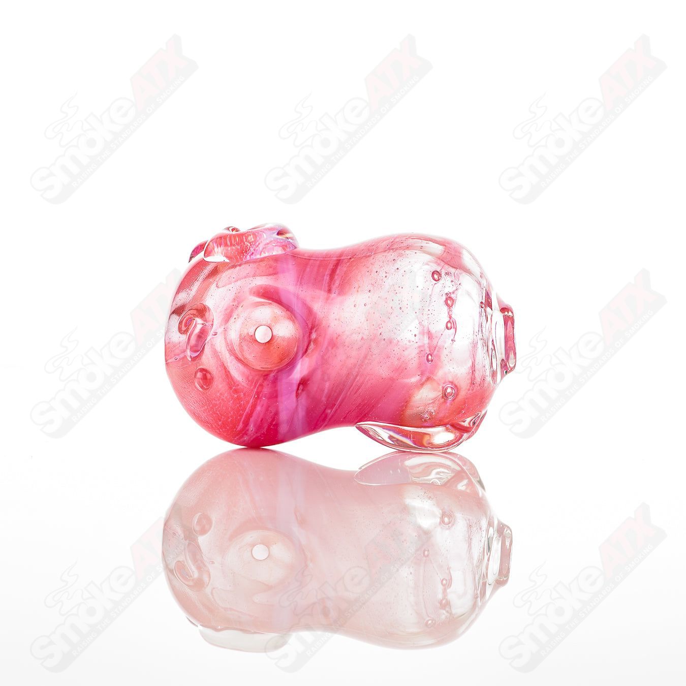 Glass pipe called the Bean Spoon by Nobody, featuring a clear glass design with a bean-shaped bowl and smooth mouthpiece.