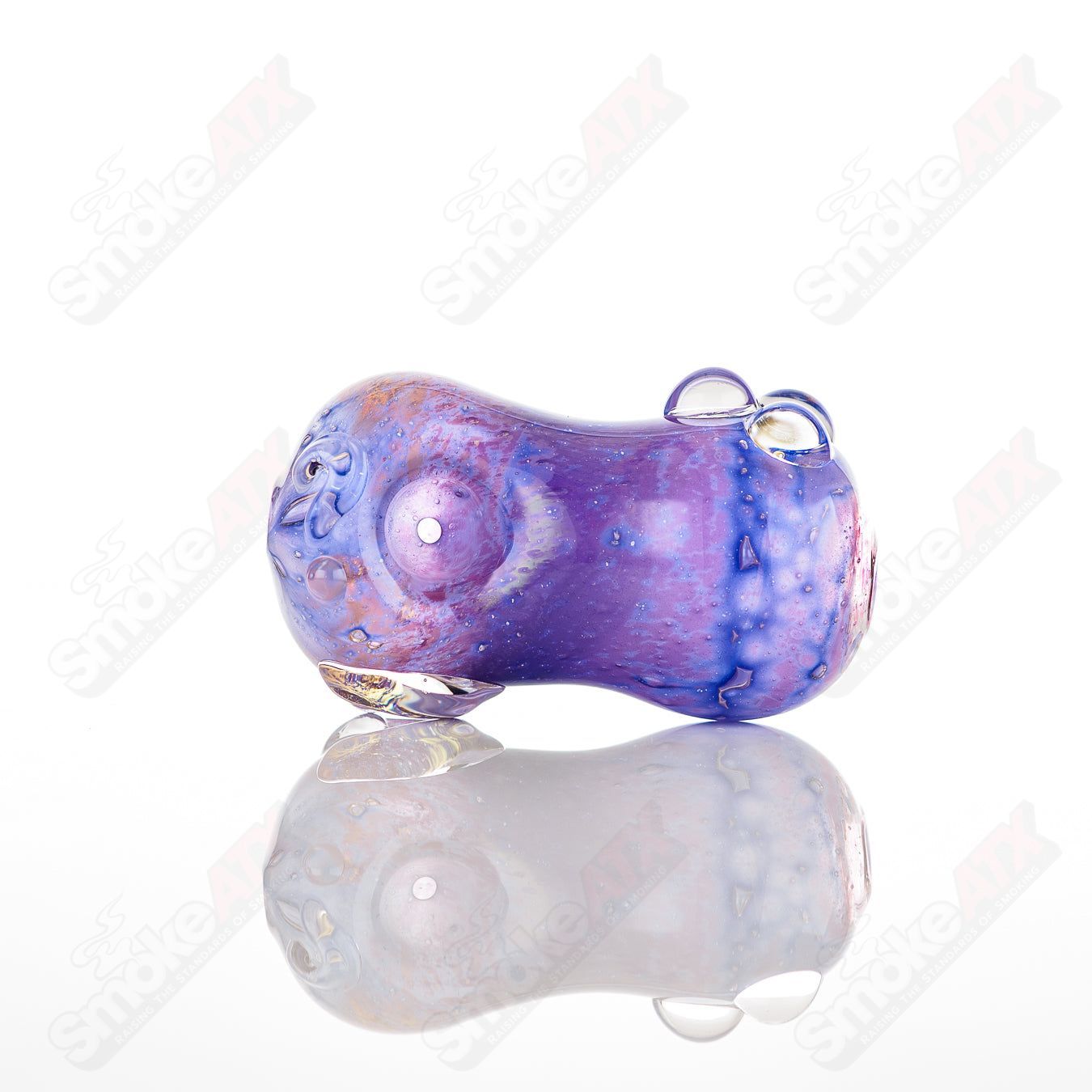 Glass pipe called #23 Bean Spoon by Nobody, clear glass with a bean-shaped bowl and smooth stem for smoking.
