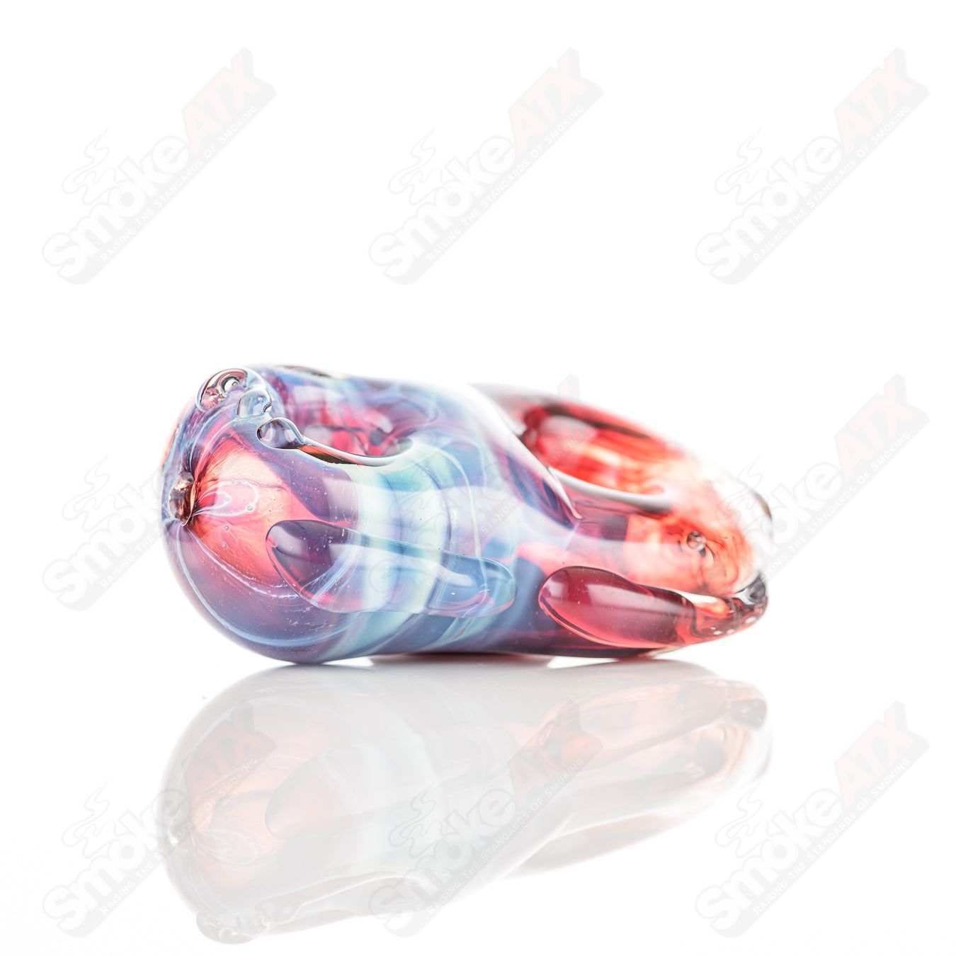Glass pipe with a colorful donut chillum design by Nobody, featuring a transparent glass body and detailed decorative elements.