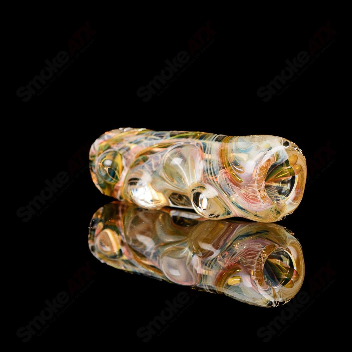 Texas Hot Glass Taster #27 Chillum glass pipe with clear glass and intricate design details.