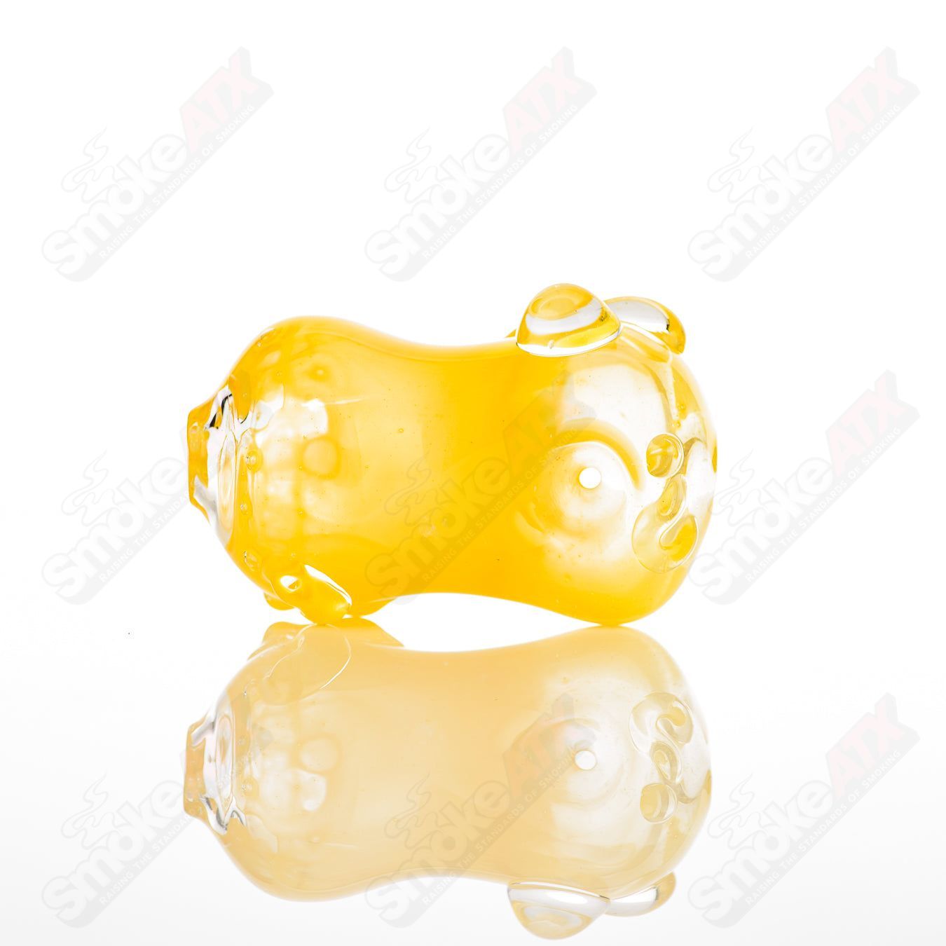 Glass pipe called the #28 Bean Spoon by Nobody, featuring a clear glass design with a bean-shaped bowl and smooth mouthpiece.