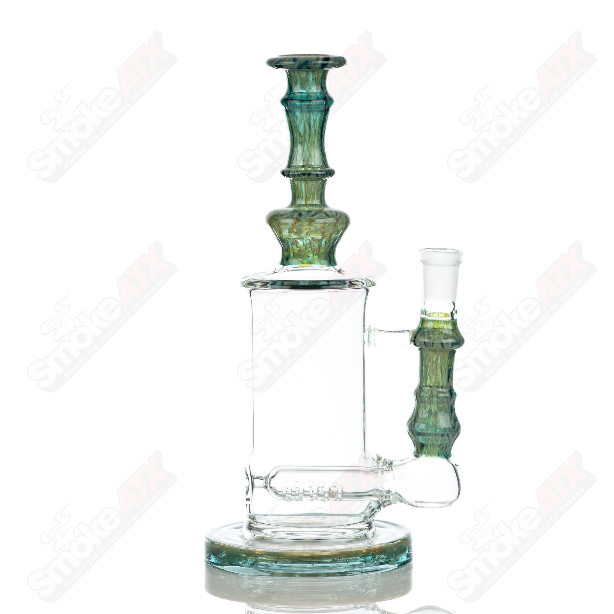 Tagle Glass inline waterpipe tube with 14mm and 60mm wrap and rake design, made of clear glass for smoking enjoyment.