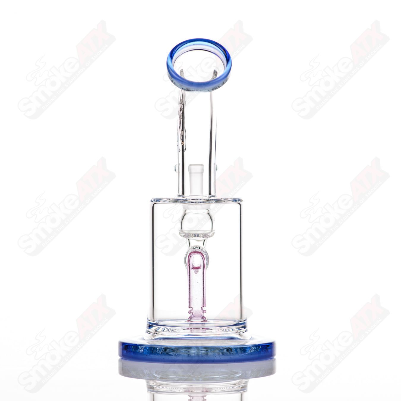 Toro 14mm Macro XL glass concentrate rig with dual-color foot and mouthpiece, featuring intricate design and clear glass construction.