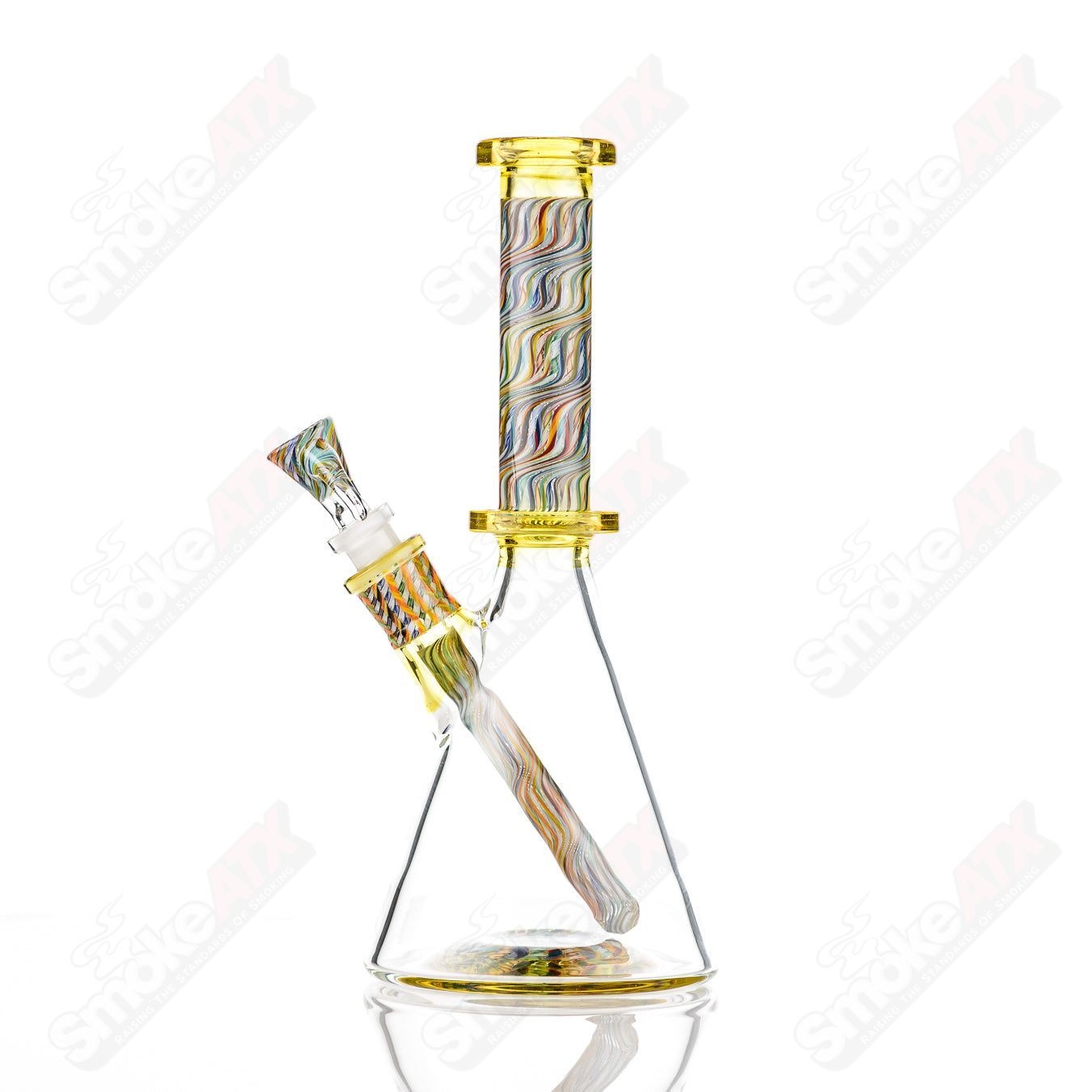 Three Stephan Peirce Glass x Harold Cooney beakers with colorful glasswork, showcasing intricate heady glass designs.