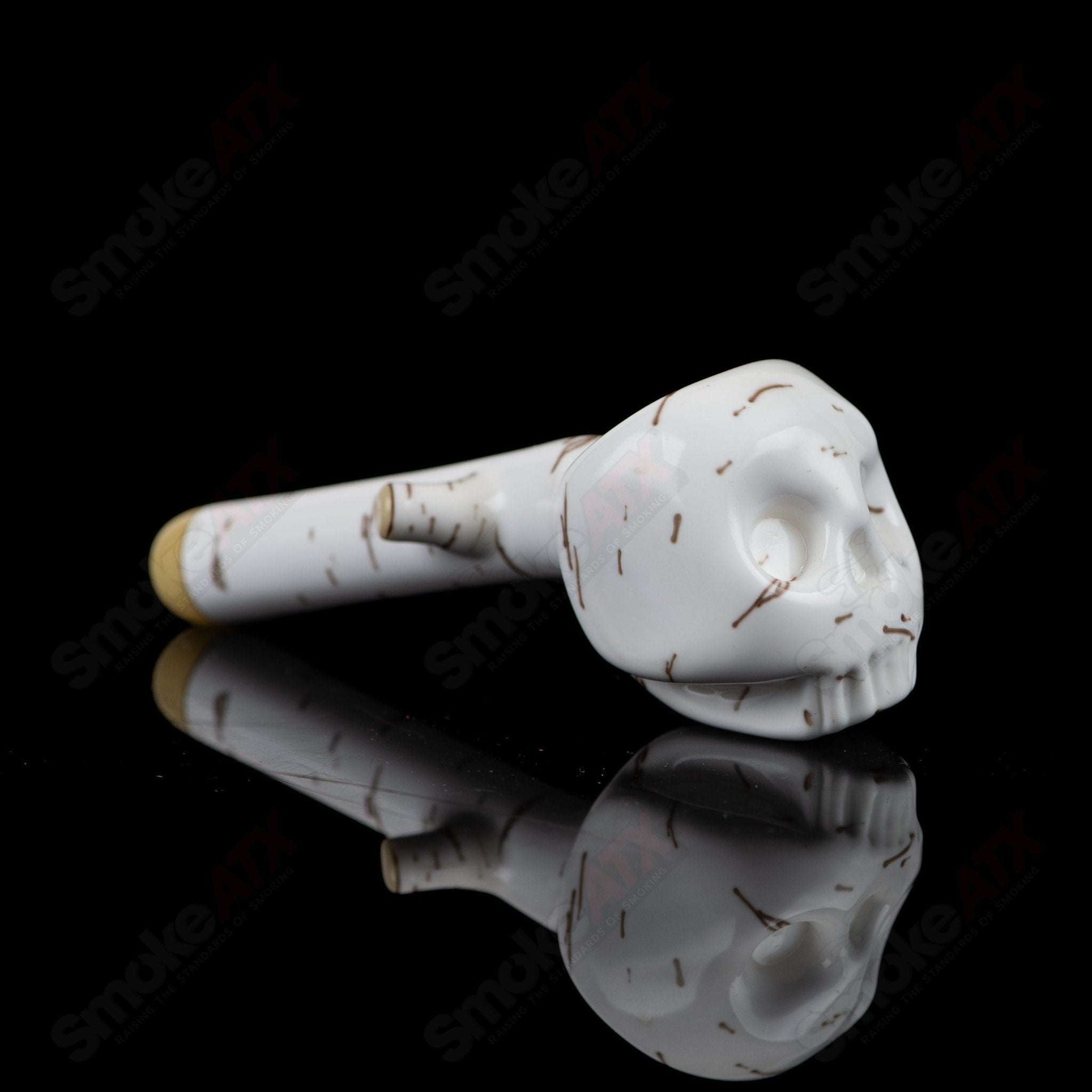 Foster Glass Heady Glass Skull Spoon Pipe featuring a 3-birch design and intricate hand-crafted details.