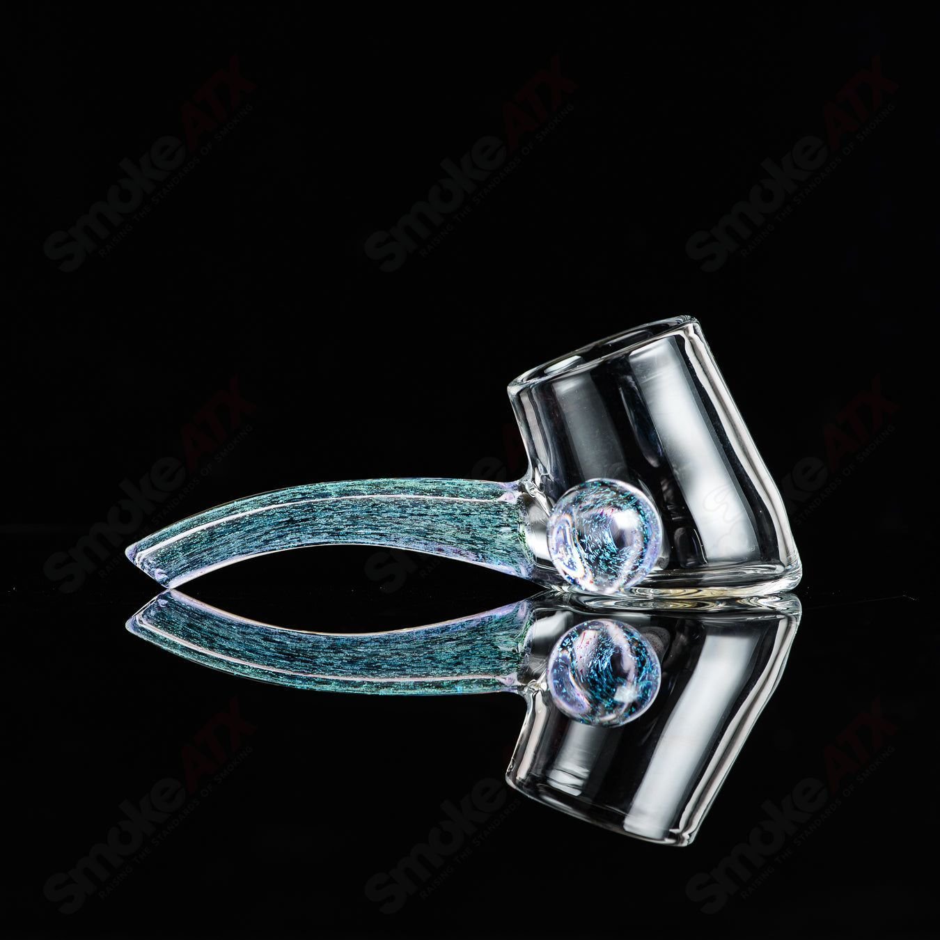Justin Freeman glass Dichro Proxy Attachment showcasing colorful, reflective glass accessory with intricate design and vibrant hues.