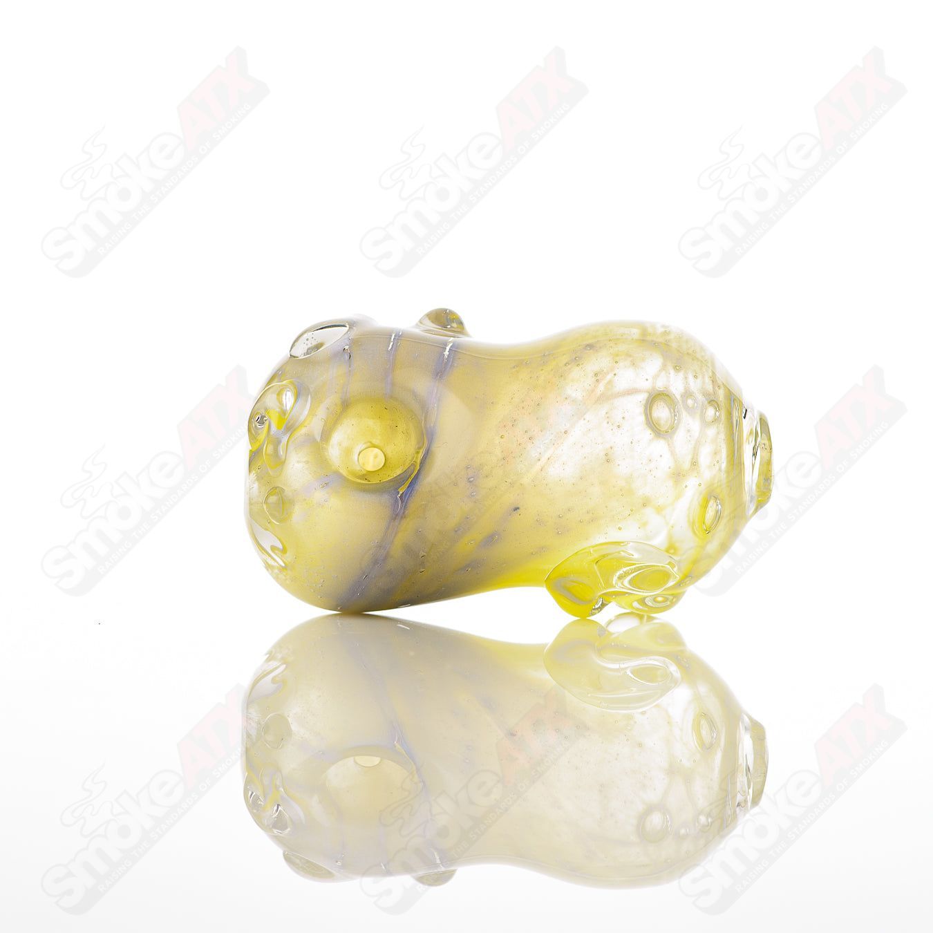 Glass pipe called the #30 Bean Spoon by Nobody, made of clear glass with a rounded bowl and smooth stem for smoking.