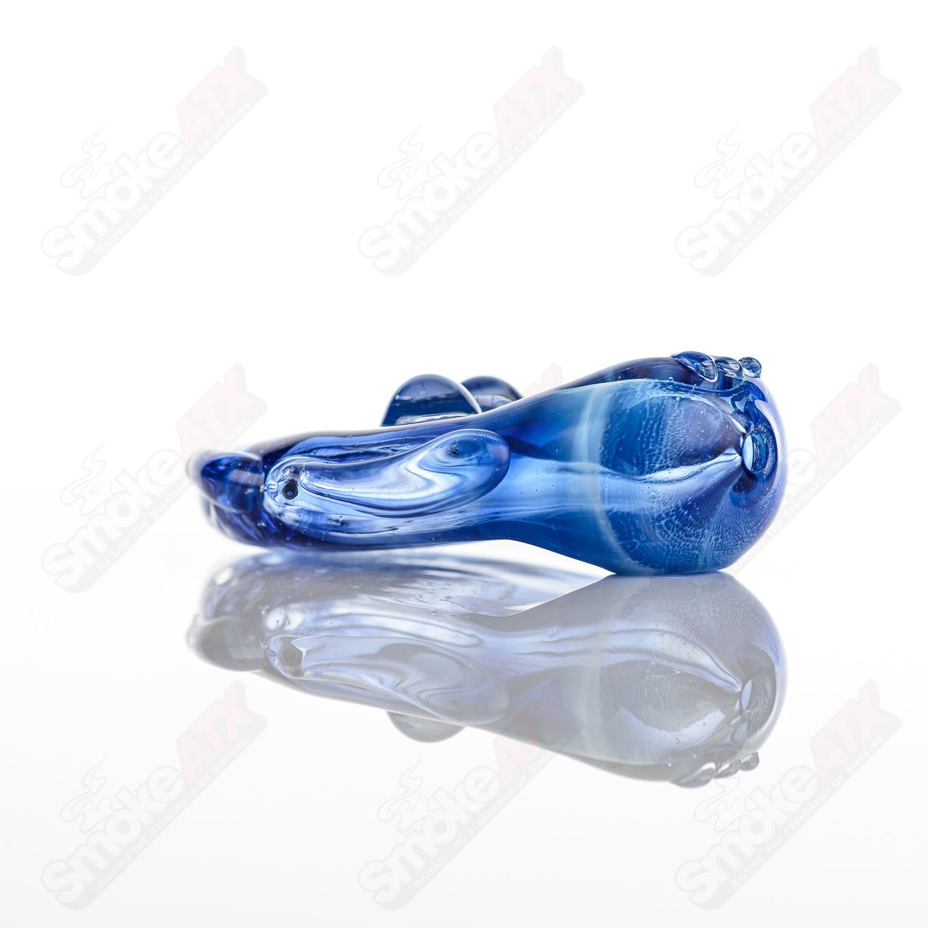 Glass pipe featuring a goddess design by Nobody, made of clear glass with intricate details, perfect for smoking accessories.